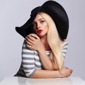 Beautiful young woman in hat. summer fashion blond girl Royalty Free Stock Photo