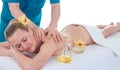 Beautiful young woman having back massage. Royalty Free Stock Photo