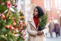 Beautiful young woman Having Fun Outdoors At Christmas Time