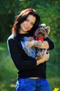 Beautiful young woman with her yorkshire terrier Royalty Free Stock Photo