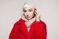 beautiful young woman in hijab and red fur. beauty stylish girl with long Nails Royalty Free Stock Photo