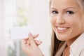 Beautiful young woman holding card Royalty Free Stock Photo