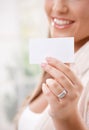 Beautiful young woman holding card Royalty Free Stock Photo