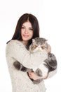 Beautiful young woman holding a cat, isolated against white background Royalty Free Stock Photo