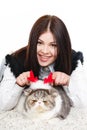 Beautiful young woman holding a cat, isolated against white background Royalty Free Stock Photo