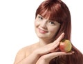 Beautiful young woman holding fresh apple