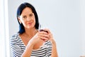 Beautiful young woman holding glass with red wine Royalty Free Stock Photo