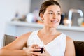 Beautiful young woman holding glass with red wine Royalty Free Stock Photo