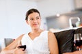 Beautiful young woman holding glass with red wine Royalty Free Stock Photo