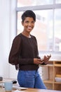 A new day, a new opportunity for progress. A beautiful young woman holding a tablet in her office. Royalty Free Stock Photo