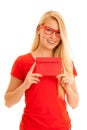 Beautiful young woman holds red envelope  - a love letter for valentines day Royalty Free Stock Photo