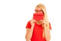 Beautiful young woman holds red envelope - a love letter for va Royalty Free Stock Photo