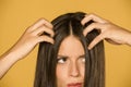 Beautiful young woman with itchy scalp Royalty Free Stock Photo