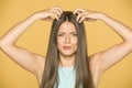 Beautiful young woman with itchy scalp Royalty Free Stock Photo