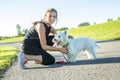 Beautiful Young Woman Jogging With Her Dog