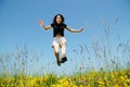 Beautiful young woman jumping Royalty Free Stock Photo