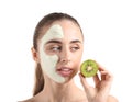 Beautiful young woman with kiwi facial mask on white background