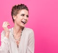 Beautiful young woman laughing. Long necklace on the neck, stylish appearance