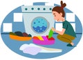 A beautiful young woman in the laundry sorting laundry Royalty Free Stock Photo