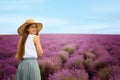 Beautiful young woman in lavender field on summer day Royalty Free Stock Photo