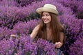 Beautiful young woman in lavender field on summer day Royalty Free Stock Photo