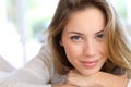 Beautiful young woman leaning head on her hands Royalty Free Stock Photo