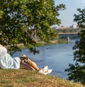 Beautiful young woman leg amputee in a dress walking in park at sunny day Royalty Free Stock Photo