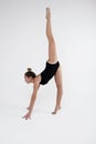 Beautiful young woman limber exerciser in the studio Royalty Free Stock Photo