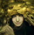 Beautiful young woman with lion mask