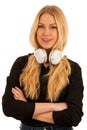 Beautiful young woman listens to the music on headphones and dan Royalty Free Stock Photo