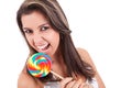 Beautiful young woman with a lollipop Royalty Free Stock Photo