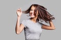 Pretty girl with long hair laughing, dancing and enjoying life Royalty Free Stock Photo