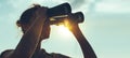 Beautiful Young Woman Looking Through Binoculars At The Sea On A Royalty Free Stock Photo