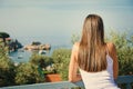 Beautiful young woman looking at the sea. Montenegro, Europe. Toning image Royalty Free Stock Photo
