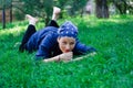 Beautiful young woman lying in the grass Royalty Free Stock Photo