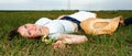 Beautiful young woman lying in grass Royalty Free Stock Photo