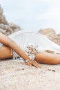 Beautiful young woman lying on sand on the beach close up Royalty Free Stock Photo
