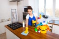 Beautiful young woman makes cleaning the house. Girl cleaning kitchen. Set.