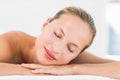 Beautiful young woman on massage table Royalty Free Stock Photo