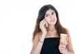 beautiful young woman on mobile phone while drinking hot drink coffee carton tea cup on isolated white background Royalty Free Stock Photo