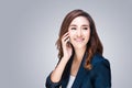 Beautiful young woman with mobile phone making a phone call Royalty Free Stock Photo