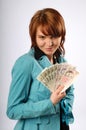 The beautiful young woman with money Royalty Free Stock Photo