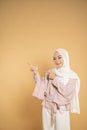 woman muslim asian woman presenting dressed in the hijab modern style Royalty Free Stock Photo