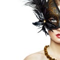 Beautiful young woman in black mysterious venetian mask Royalty Free Stock Photo