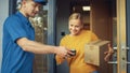 Beautiful Young Woman Opens Doors of Her House and Meets Delivery Man who Gives Her Cardboard Box Royalty Free Stock Photo