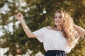 Portrait of a cute girl outdoors in a summer park Royalty Free Stock Photo