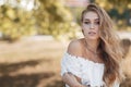 Portrait of a cute girl outdoors in a summer park Royalty Free Stock Photo