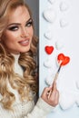 Woman painting red hearts Royalty Free Stock Photo