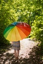 Beautiful young woman with parasol