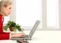 Beautiful Young Woman Paying Bills Online Royalty Free Stock Photo